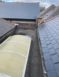 the roof of a house with a glass roof